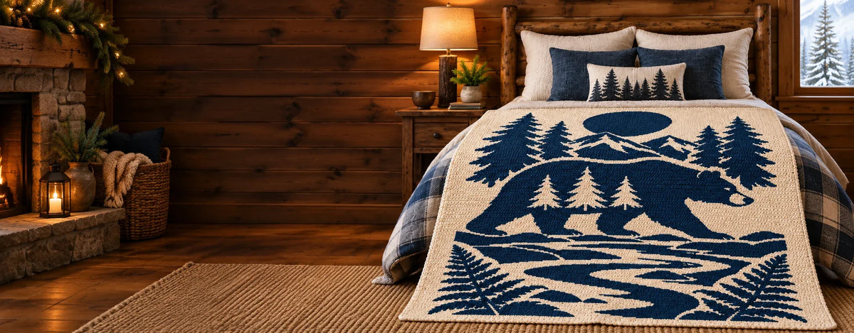 Bear Moon Mountains crochet blanket in a cozy woodland cabin
