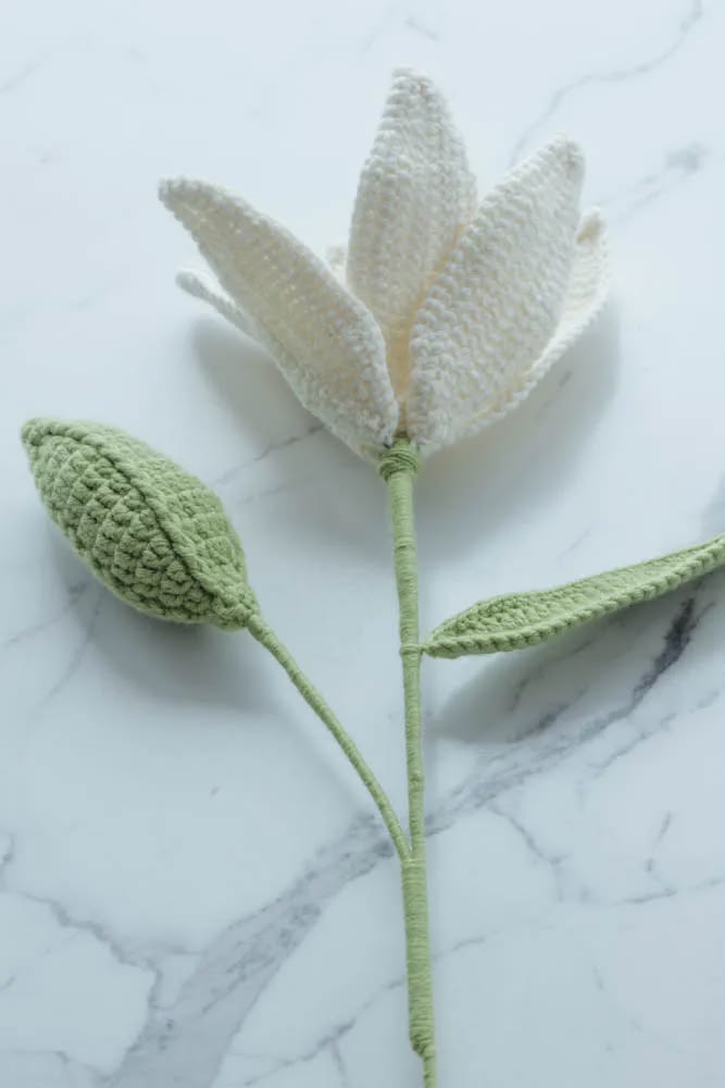 crochet lily made with soft natural wool yarn